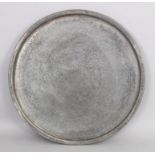 A TINNED COPPER TRAY, CENTRAL ASIA, EARLY 20TH CENTURY, OF CIRCULAR FORM, with raised rim, decorated