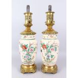 A GOOD PAIR OF JAPANESE SATSUMA PORCELAIN VASES, converted to lamps with ormolu mounts.