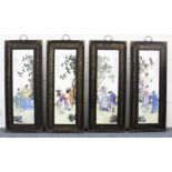 A SET OF FOUR FRAMED CHINESE PORCELAIN PLAQUES.