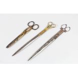 THREE PAIRS OF 19TH CENTURY OTTOMAN SILVER AND GOLD INLAID SCISSORS.