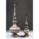 TWO 19TH CENTURY INDIAN SILVER ROSEWATER SPRINKLERS, the large one 30cm high with Islamic script,