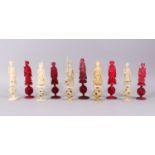ELEVEN CANTON IVORY AND STAINED IVORY CHESS PIECES, 16 & 17cm high.
