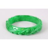 A CHINESE APPLE GREEN BANGLE.