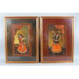 A PAIR OF 19TH CENTURY PERSIAN QAJAR FRAMED PORTRAITS of young ladies, image 36cm x 20cm.