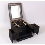 A GOOD CEYLON CARVED WOOD FOLDING DRESSING TABLE BOX, opening to reveal mirror, compartments and