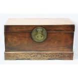 A LARGE 18TH CENTURY CHINESE WOODEN CHEST, with plain rising top, large engraved brass lock double