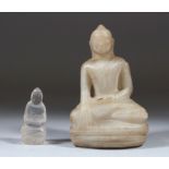 A 19TH CENTURY BURMESE CARVED MARBLE BUDDHA, 12cm high and a rock crystal Buddha, 5cm high (2).