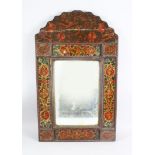 A 19TH CENTURY PERSIAN QAJAR HAND PAINTED WOODEN MIRROR, with shaped top, the mirrored panel