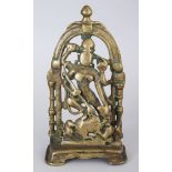 A BRASS SHRINE DEPICTING DURGA SLAYING THE BUFFALO DEMON (MAHISASURAMARDINI), WESTERN INDIA, CIRCA