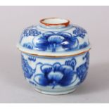 A SMALL CHINESE BLUE AND WHITE CIRCULAR POT AND COVER. 7cm diameter.