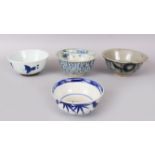 A MING BLUE AND WHITE CIRCULAR BOWL, 12cm diameter, and three other bowls (4).