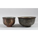 TWO 17TH/18TH CENTURY INDO-PERSIAN ENGRAVED COPPER BOWLS, one tinned, 16cm and 12cm diameter.