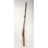 AN 18TH CENTURY 20 BORE INDIAN LONG GUN, 160cm long.