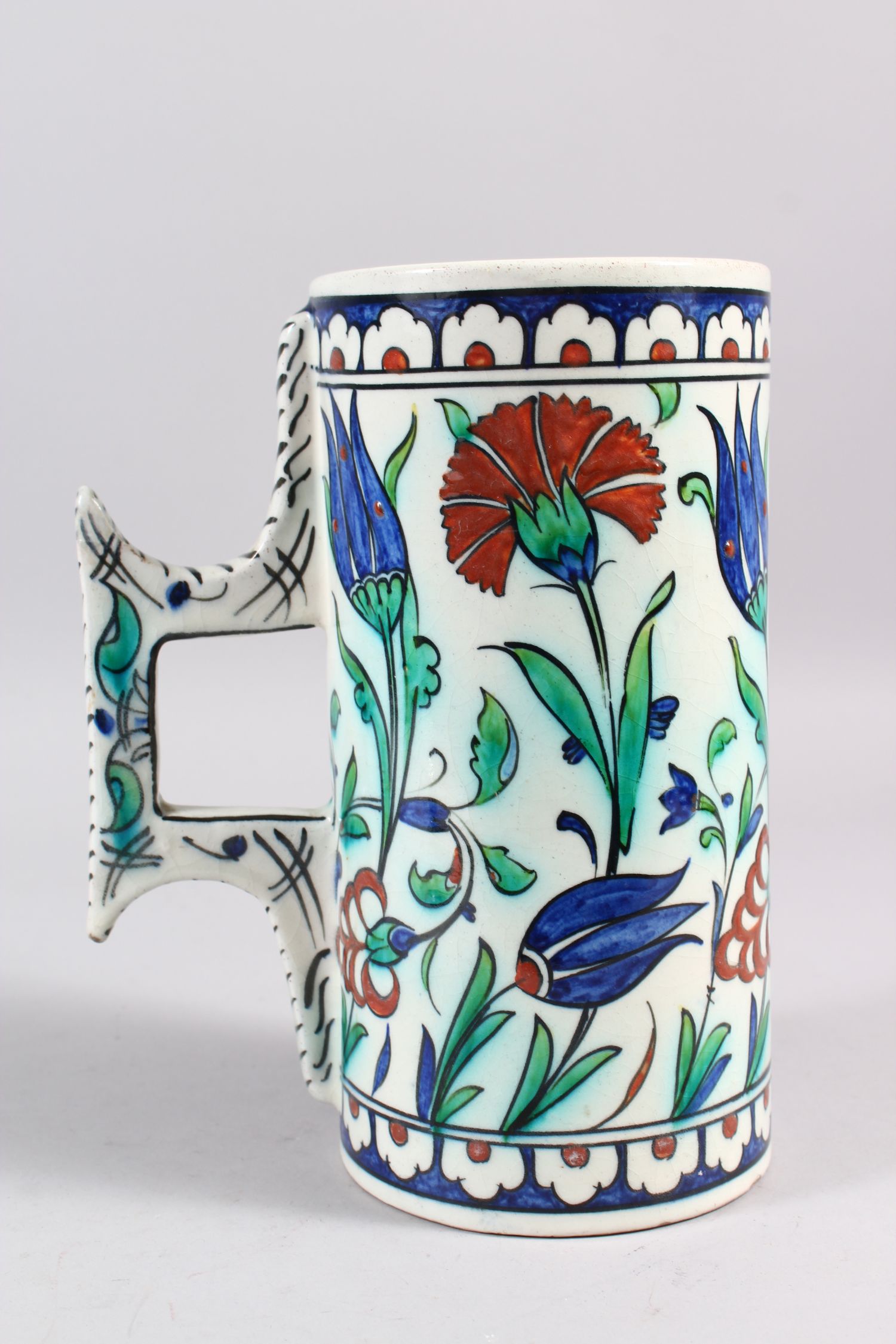 A 19TH CENTURY CANTAGALLI IZNIK STYLE POTTERY TANKARD, the sides with blue ground and flower - Image 3 of 7