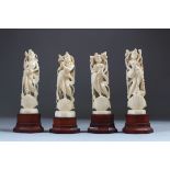A SET OF FOUR INDIAN CARVED FIGURES OF GODDESSES on wooden bases, figures 13cm high.