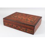 A 20TH CENTURY BURMESE LAQUER BOX with fitted interior, 33cm long, 24cm wide.