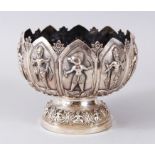 A GOOD INDIAN SOLID SILVER SWARMI MADRAS LOBED BOWL- heavily embossed with various deities within