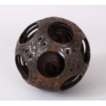 A LARGE CHINESE CARVED AND PIERCED SOAPSTONE CONCENTRIC BALL. 12cm diameter.