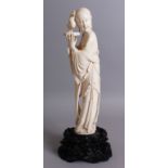 A FINE QUALITY CHINESE IVORY FIGURE OF A BEAUTIFUL WOMAN/MAIDEN, wearing traditional robes with