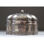 AN 18TH CENTURY MUGHAL INDIAN SILVER SHAPED BOX AND COVER, inscription on the front, 13cm long,