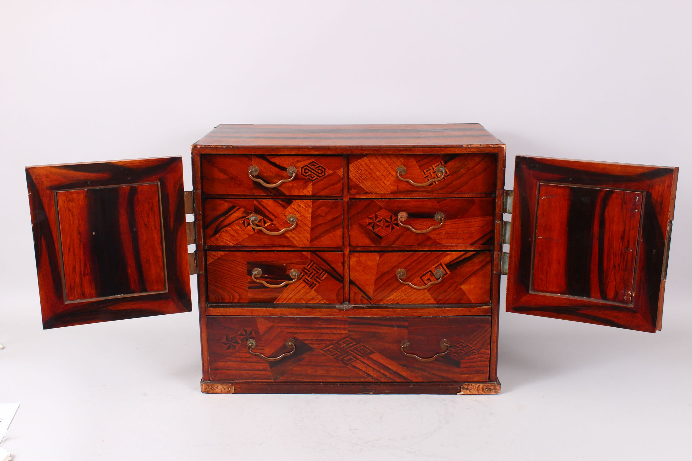 A 19TH CENTURY JAPANESE PARQUETRY CABINET, with double panel doors enclosing 4 drawers over a long - Image 3 of 10