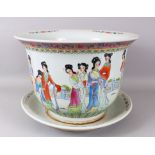 A GOOD JARDINIEIRE AND STAND, painted with figures and calligraphy. 45cm diameter.