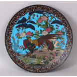 A LARGE JAPANESE CLOISONNE ENAMEL CIRCULAR CHARGER, the front decorated with brilliant coloured