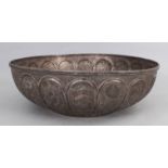 A LARGE SILVER PLATED COPPER BOWL, PERSIA, EARLY 20TH CENTURY, the sides with lotus medallions