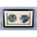 AN EARLY PAIR OF PERSIAN POTTERY FRAGMENTS, CIRCA 14TH CENTURY, framed and glazed, one with Kufic