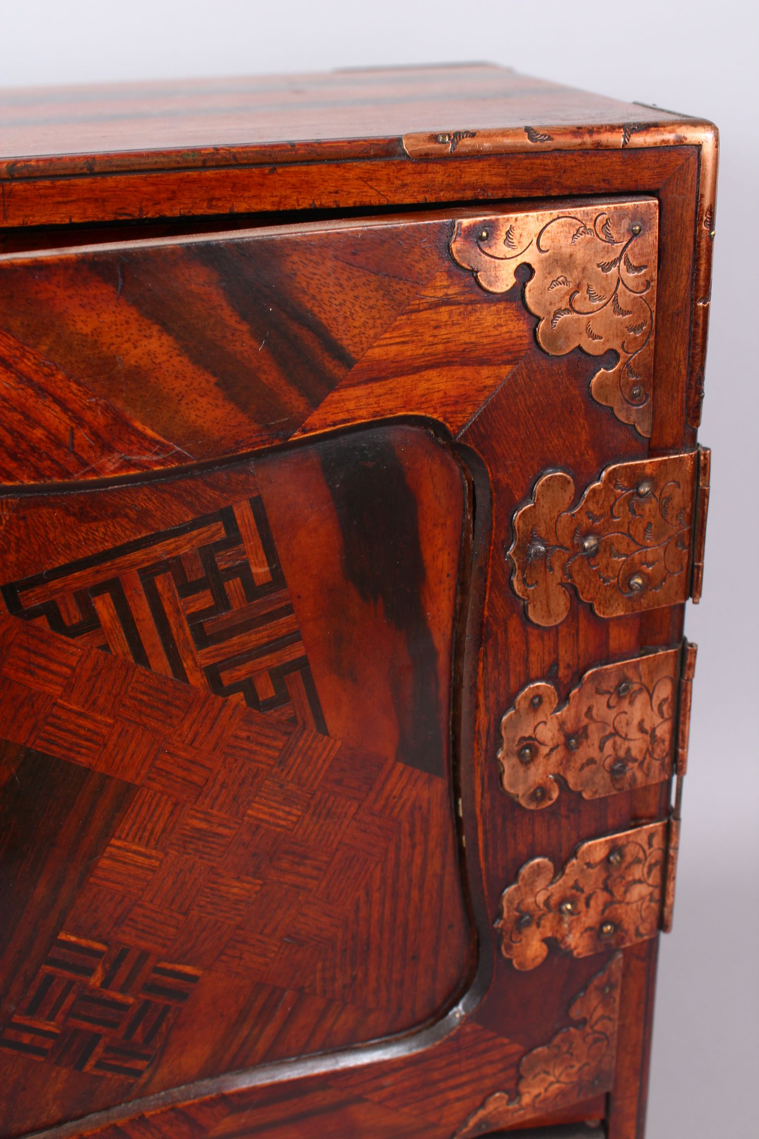 A 19TH CENTURY JAPANESE PARQUETRY CABINET, with double panel doors enclosing 4 drawers over a long - Image 9 of 10