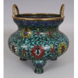 A GOOD CHINESE MING STYLE CLOISONNE TRIPOD CENSER, possibly early, decorated with formal scrolling