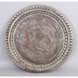 A TINNED COPPER TRAY, PERSIA, 20TH CENTURY, OF CIRCULAR FORM, WITH SCALLOPED CAVETTO, engraved