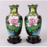 A PAIR OF JAPANESE CLOISONNE ENAMEL VASES AND STANDS, decorated with flowers and birds. 16cm high.