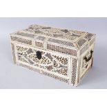 A GOOD PAIR OF 19TH CENTURY PIERCED IVORY CANTON THREE DIVISION TEA CADDY, with wooden liner,