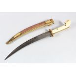 AN 18TH-19TH CENTURY OTTOMAN TURKISH IVORY HILTED TOMBAK DAGGER, in sheath, 40cm long.