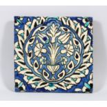 A 17TH CENTURY DAMASCUS GLAZED SQUARE POTTERY TILE, 20cm square.