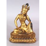 A SINO TIBETAN GILT BRONZE FIGURE OF A BODHISATTVA, seated in a meditative posture upon a double