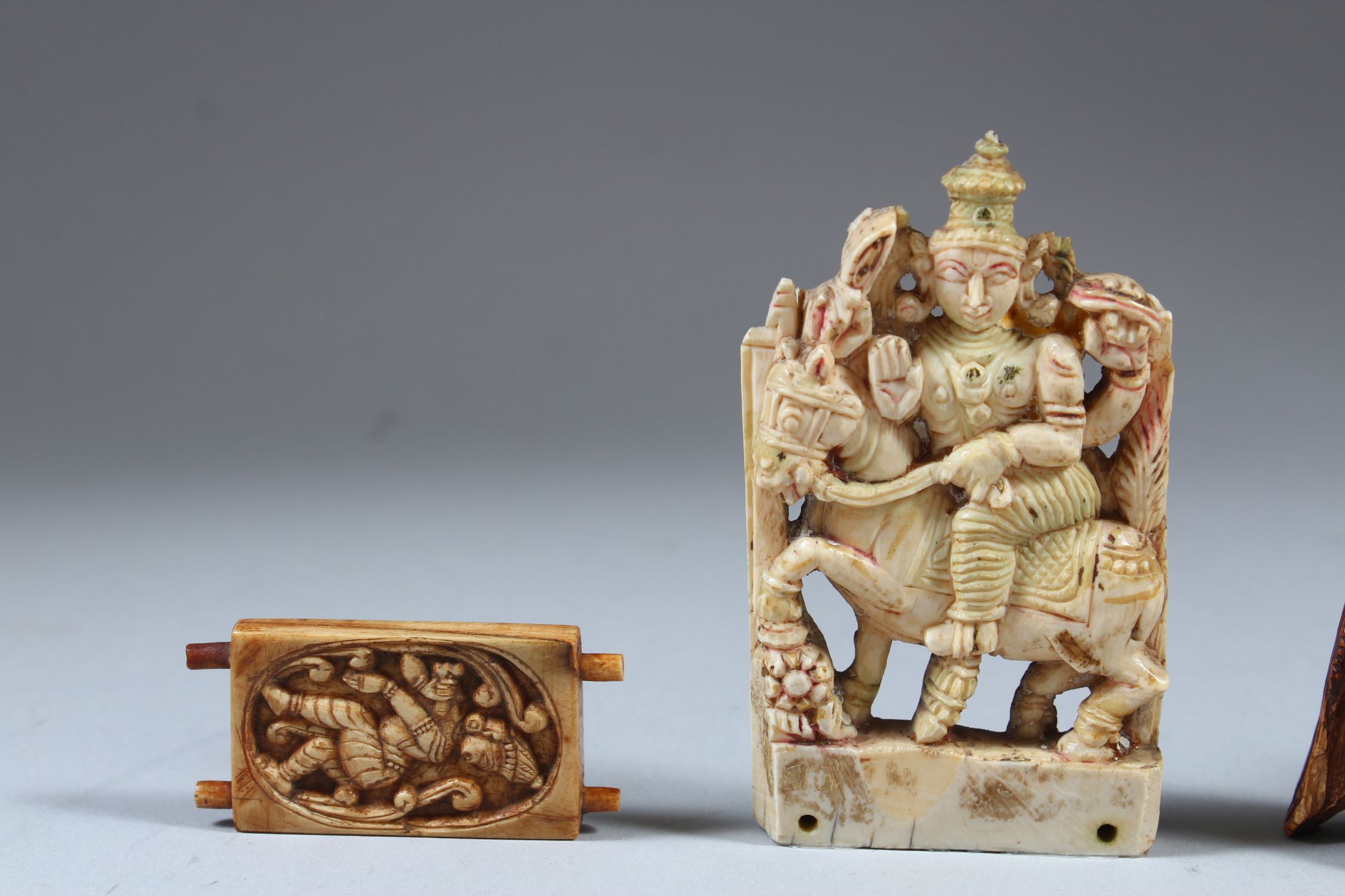 A COLLECTION OF FOUR 17TH-18TH CENTURY SOUTH INDIAN CARVED IVORY PIECES. Depicting Ganesha, - Image 2 of 4