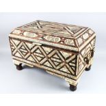 A LARGE 19TH CENTURY MOROCCAN ISLAMIC INLAID BONE AND CORAL CASKET, with brass carrying handles on