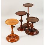 A LATE 19TH CENTURY BOXWOOD TURNED CIRCULAR ADJUSTABLE STAND, with three similar mahogany stands.