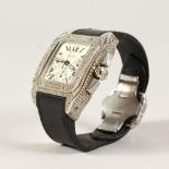A SUPERB CARTIER STAINLESS STEEL TANK LIMITED EDITION WRISTWATCH. Automatic No. 31117308 2740, the