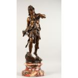 HENRY WEISS. A GOOD 19TH CENTURY BRONZE OF A HUNTER, holding a spear in one hand, his quarry in