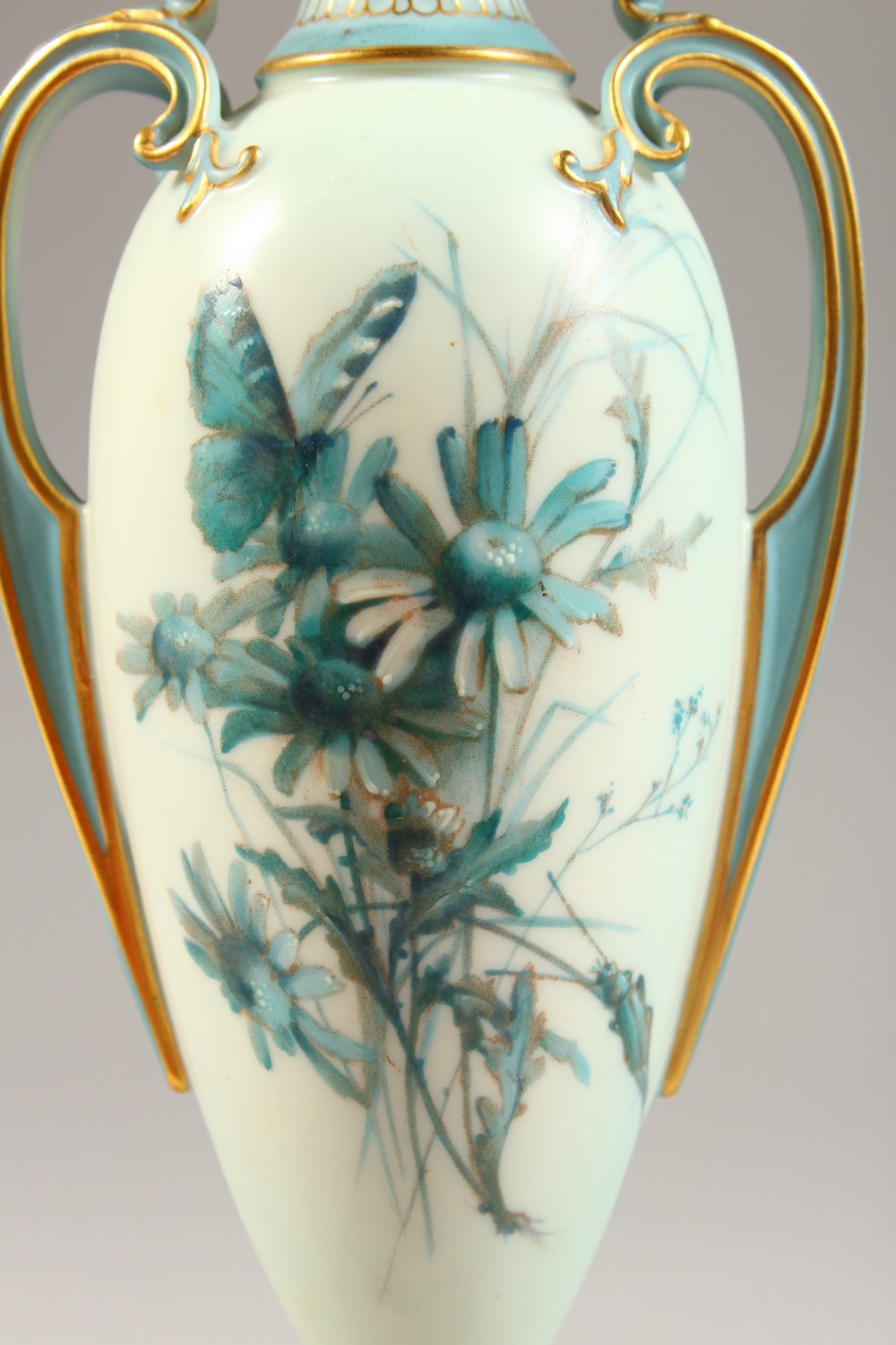 A ROYAL WORCESTER PEDESTAL VASE, No. 1957, pale blue ground decorated with floral sprays. 8.5ins - Image 2 of 7