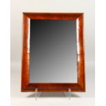 AN 18TH CENTURY WALNUT CUSHION FRAMED MIRROR. 20.5ins x 16ins.