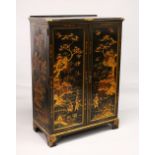 A 20TH CENTURY BLACK LACQUER AND CHINOISSERIE DECORATED TWO DOOR CUPBOARD, supported on bracket