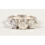 AN 18CT THREE STONE DIAMOND RING of 2.3cts.