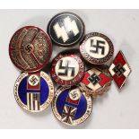 EIGHT ENAMEL AND OTHER BADGES.