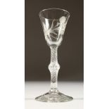 AN 18TH CENTURY WINE GLASS, the bell shaped bowl engraved with flowers and a moth, with a clear