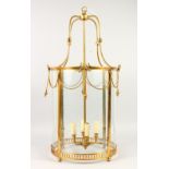 A GEORGIAN STYLE BRASS AND GLASS HALL LANTERN. 32ins high.