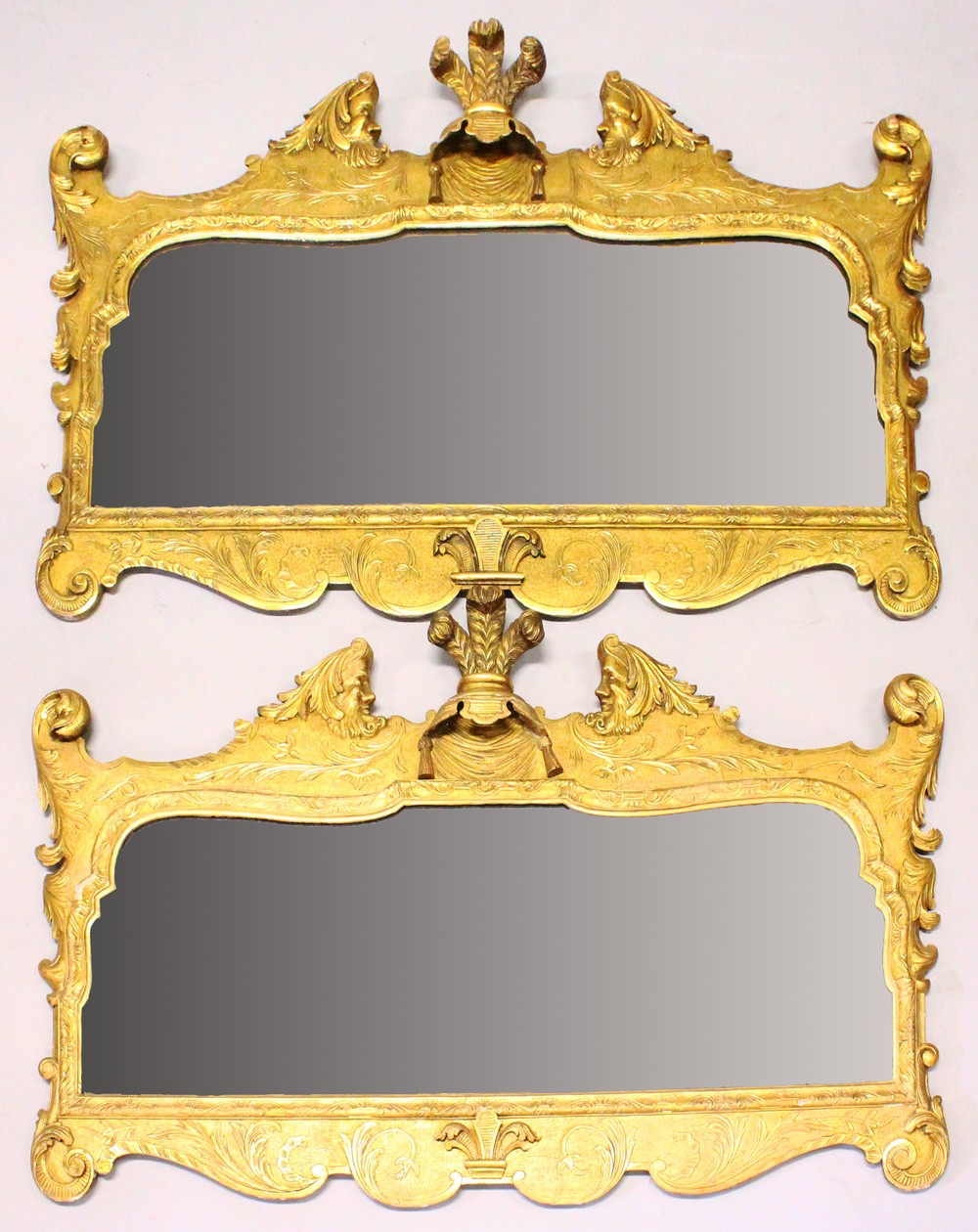 A GOOD PAIR OF 18TH CENTURY GILTWOOD OVERMANTLE MIRRORS, with Prince of Wales cresting, figural